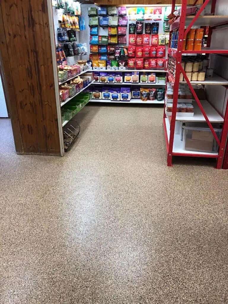 Storage room with mica-infused full flake epoxy flooring.